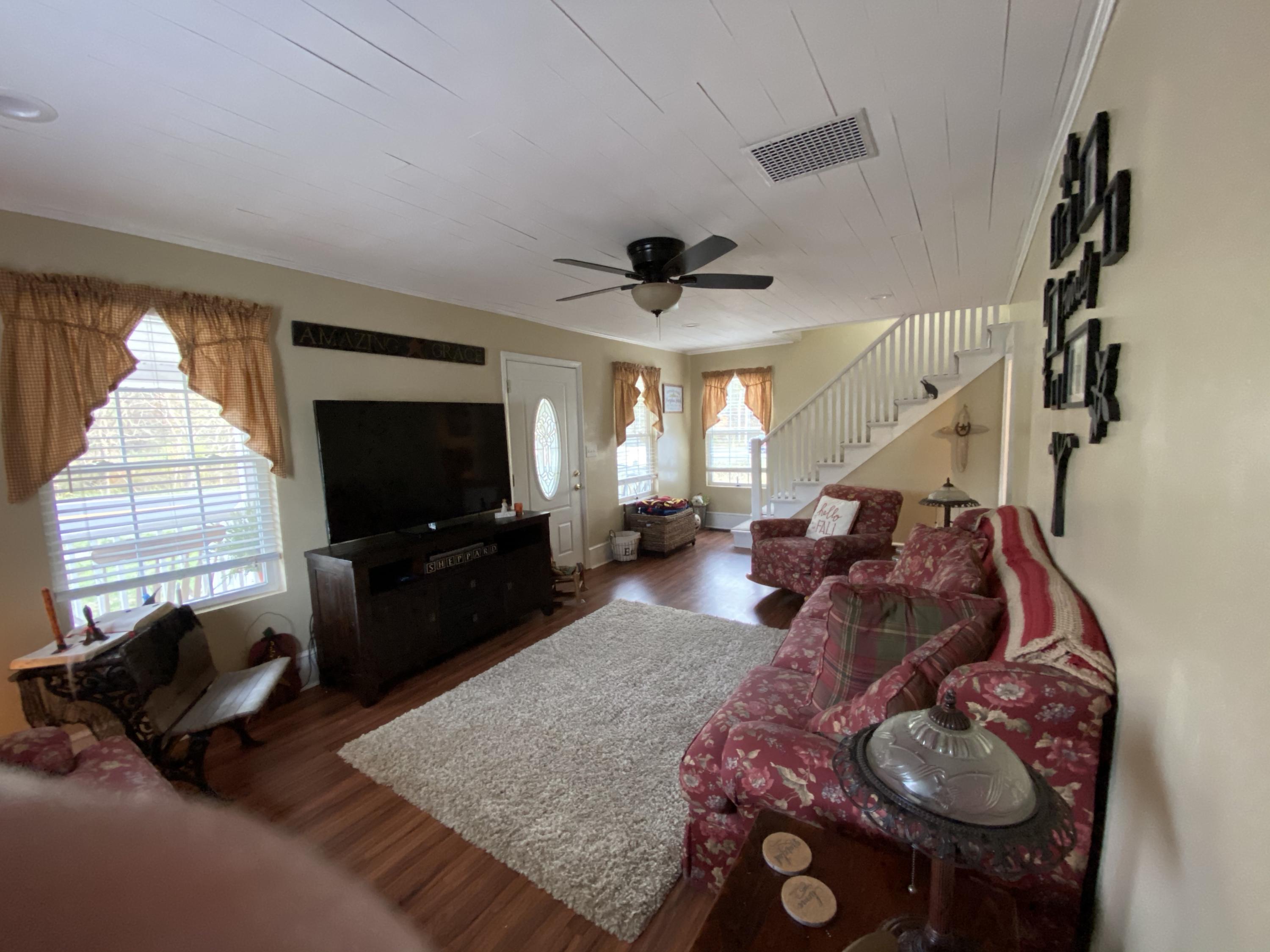 2211 Riner Road Christiansburg, VA 24073 - Photo 6 of 15 a living room with furniture and a flat screen tv