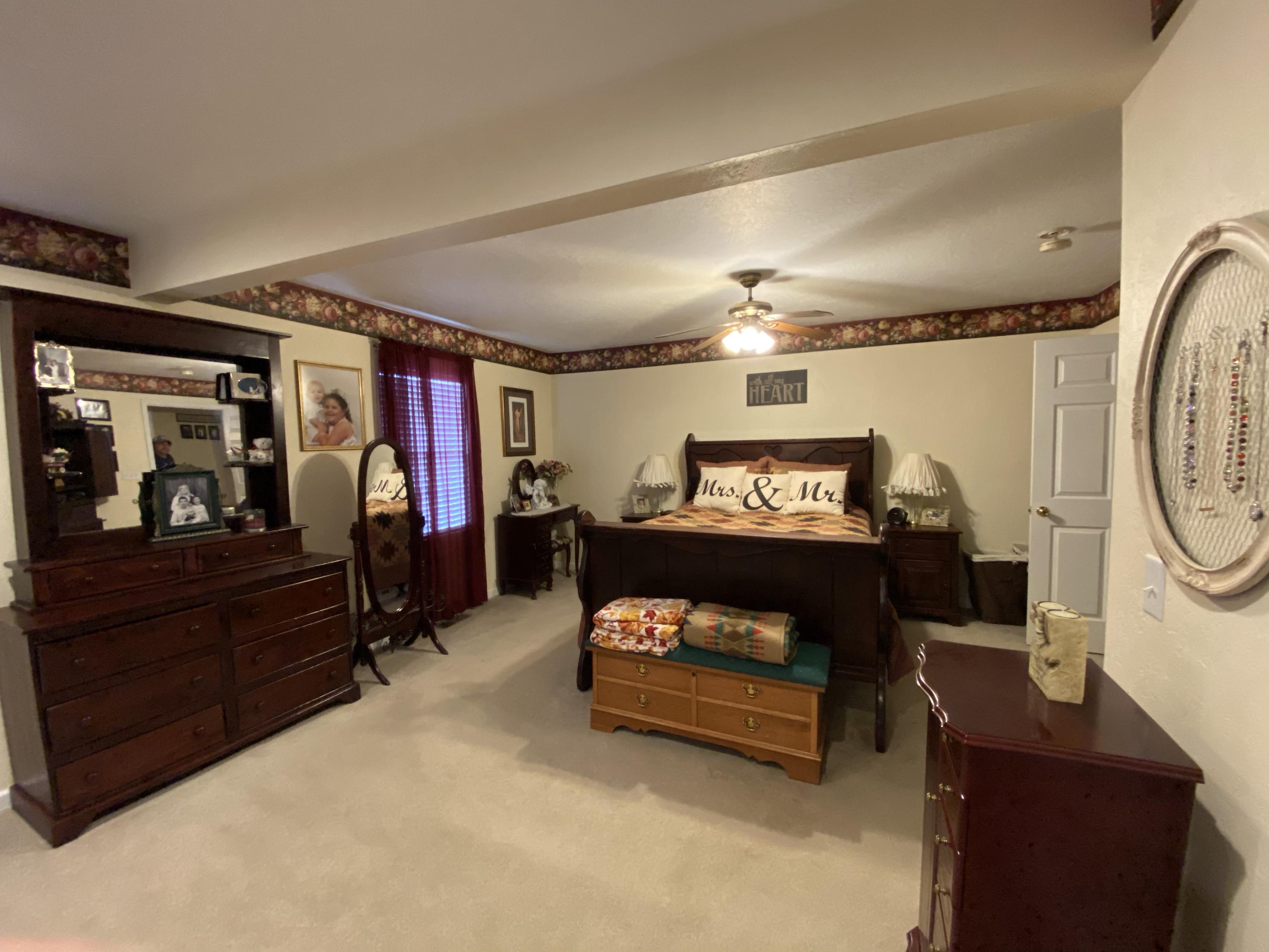 2211 Riner Road Christiansburg, VA 24073 - Photo 7 of 15 a living room with furniture a ceiling fan and a window
