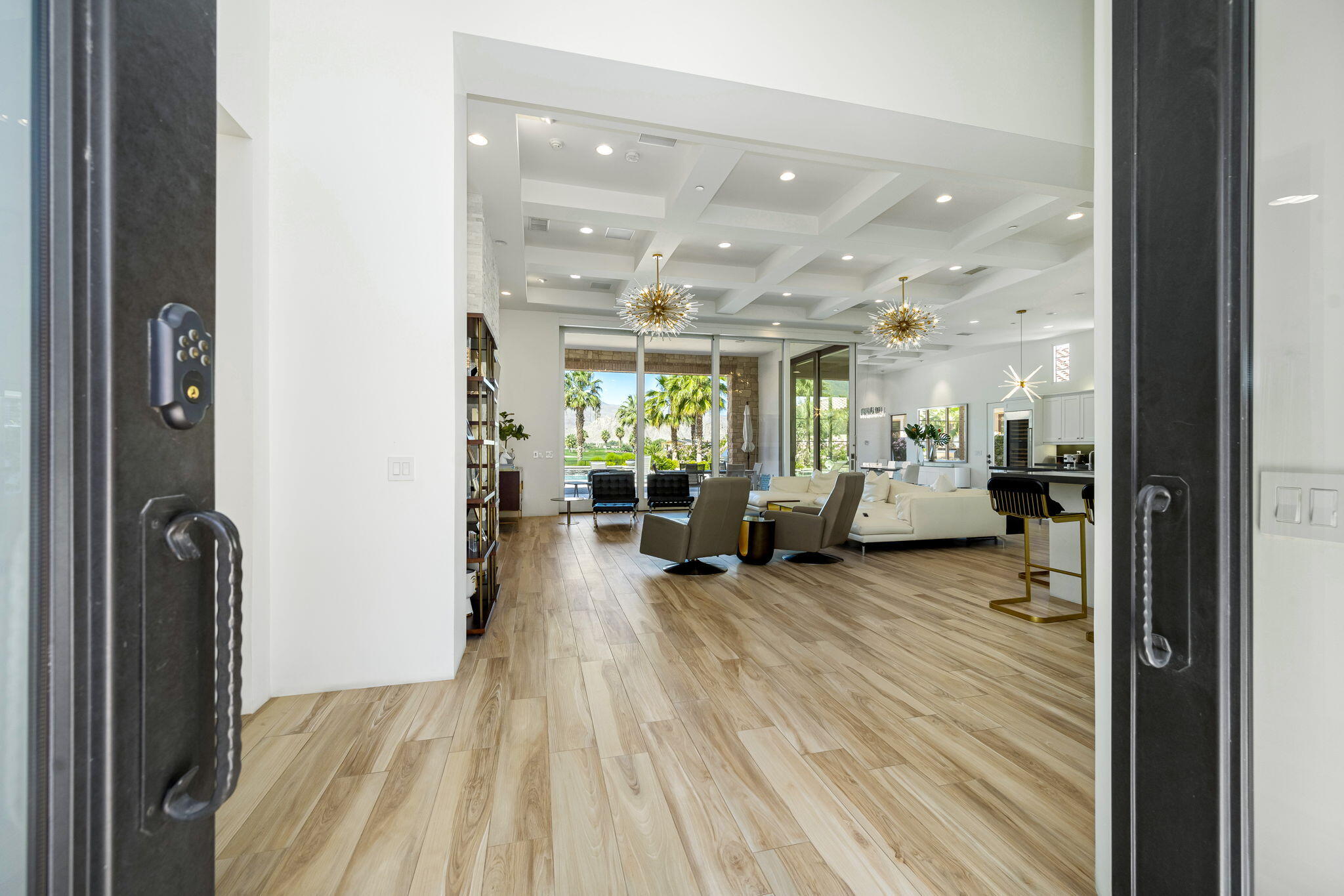 59805 Seville La Quinta, CA 92253 - Photo 12 of 61 a living room with furniture and a wooden floor