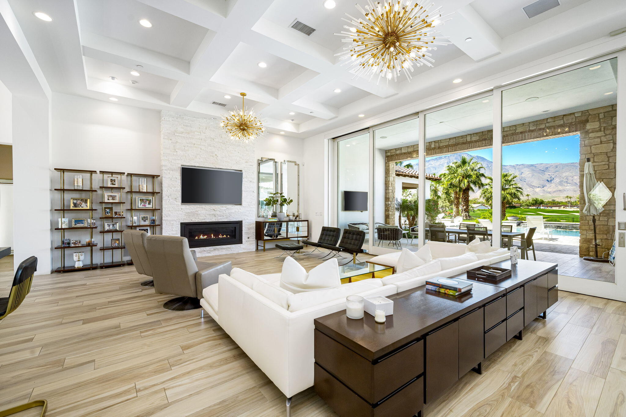 59805 Seville La Quinta, CA 92253 - Photo 4 of 61 a living room with fireplace furniture and a flat screen tv