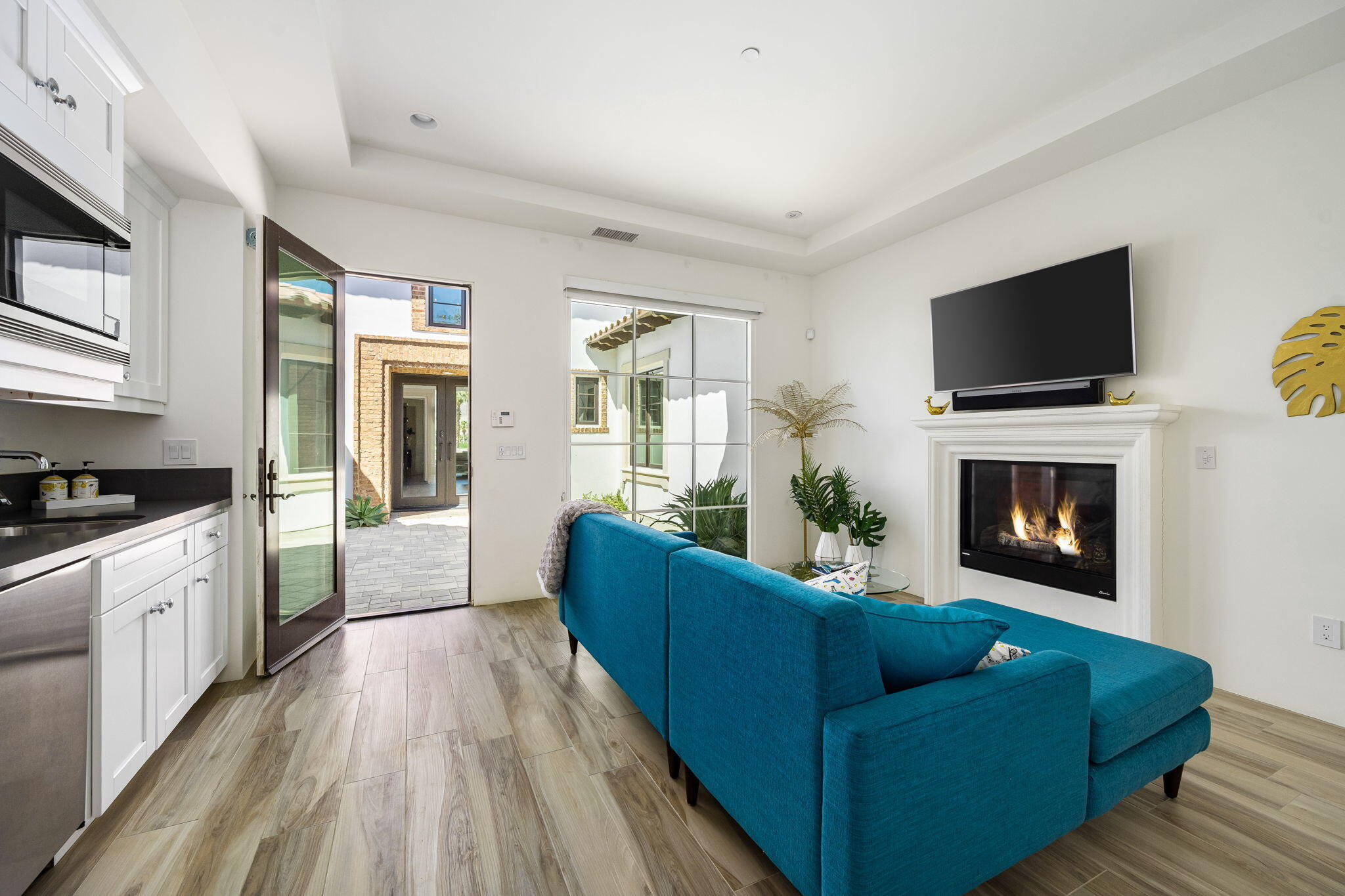 59805 Seville La Quinta, CA 92253 - Photo 45 of 61 a living room with furniture and a fireplace
