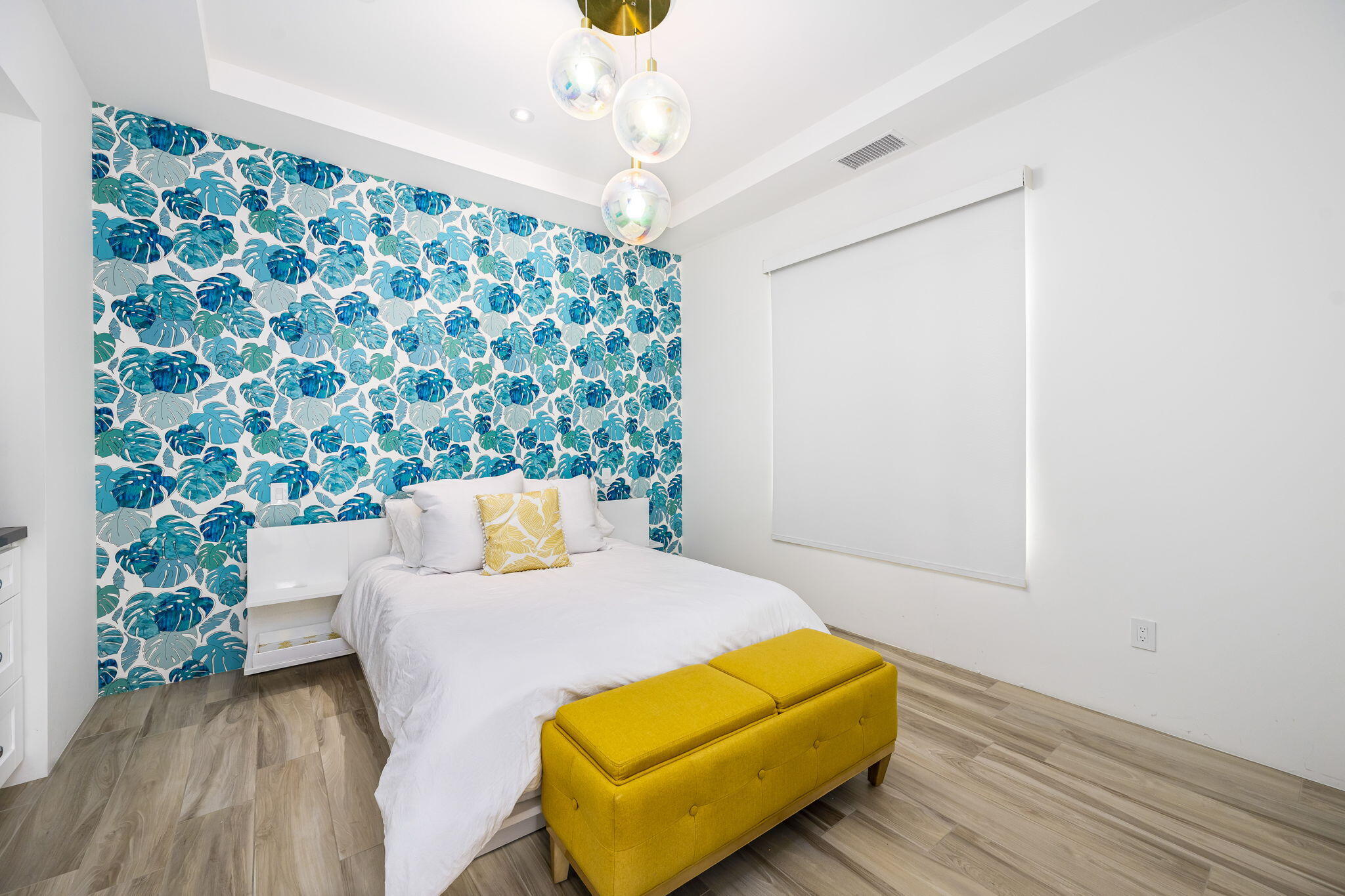 59805 Seville La Quinta, CA 92253 - Photo 46 of 61 a bedroom with a bed and a lamp next to a window