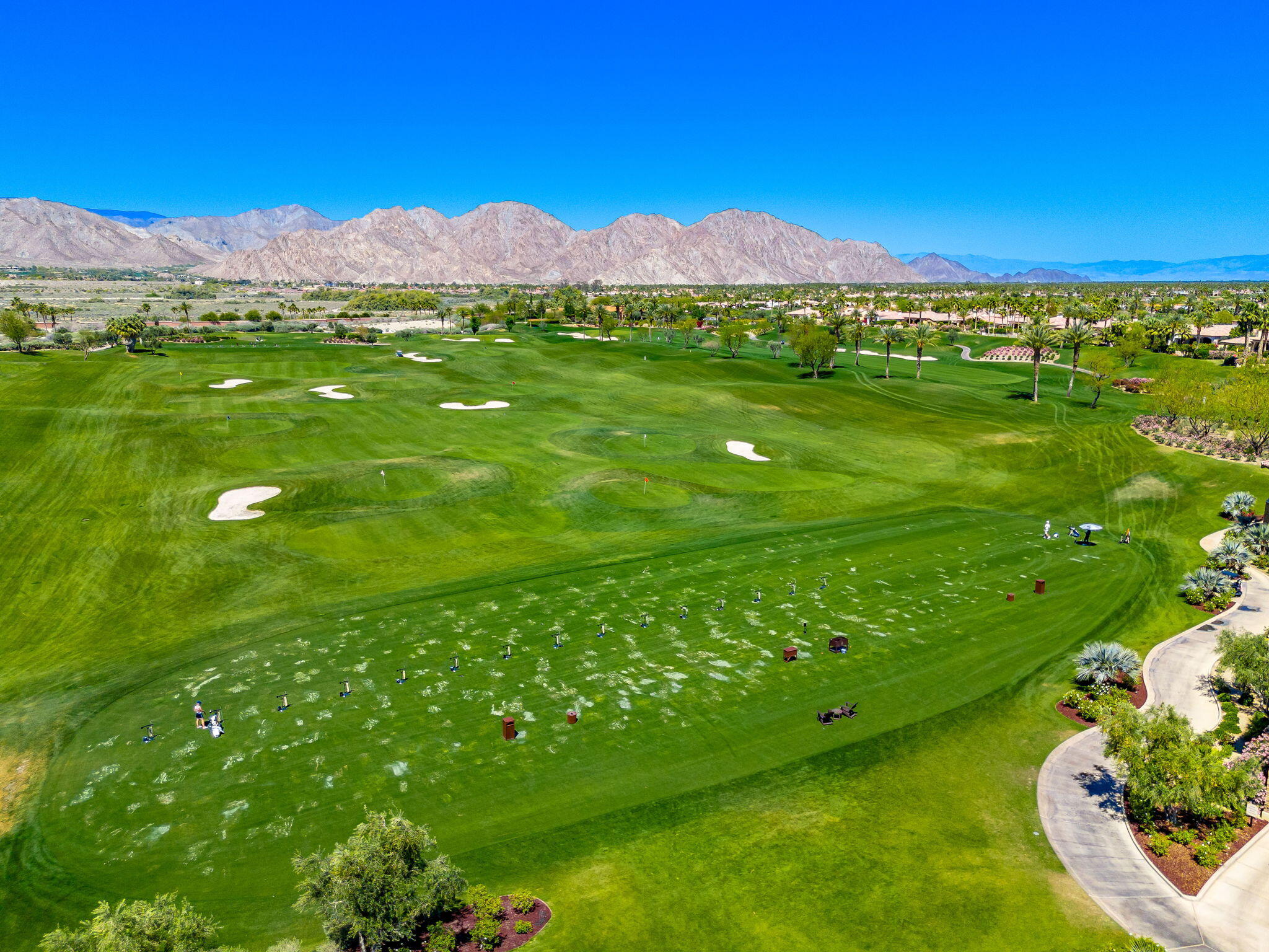 59805 Seville La Quinta, CA 92253 - Photo 57 of 61 a view of an houses with outdoor space and mountain view