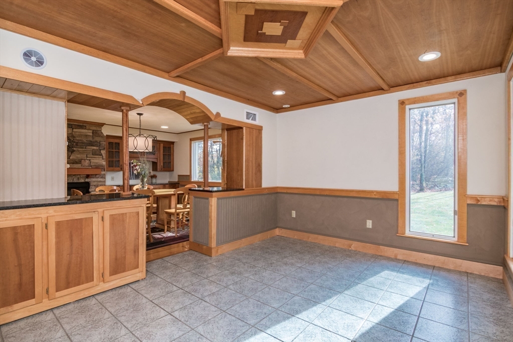 29 Rattle Hill Road Southampton, MA 01073 - Photo 11 of 42 a open kitchen with stainless steel appliances granite countertop a refrigerator and a stove