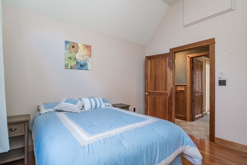 29 Rattle Hill Road Southampton, MA 01073 - Photo 29 of 42 a bedroom with a bed and a table