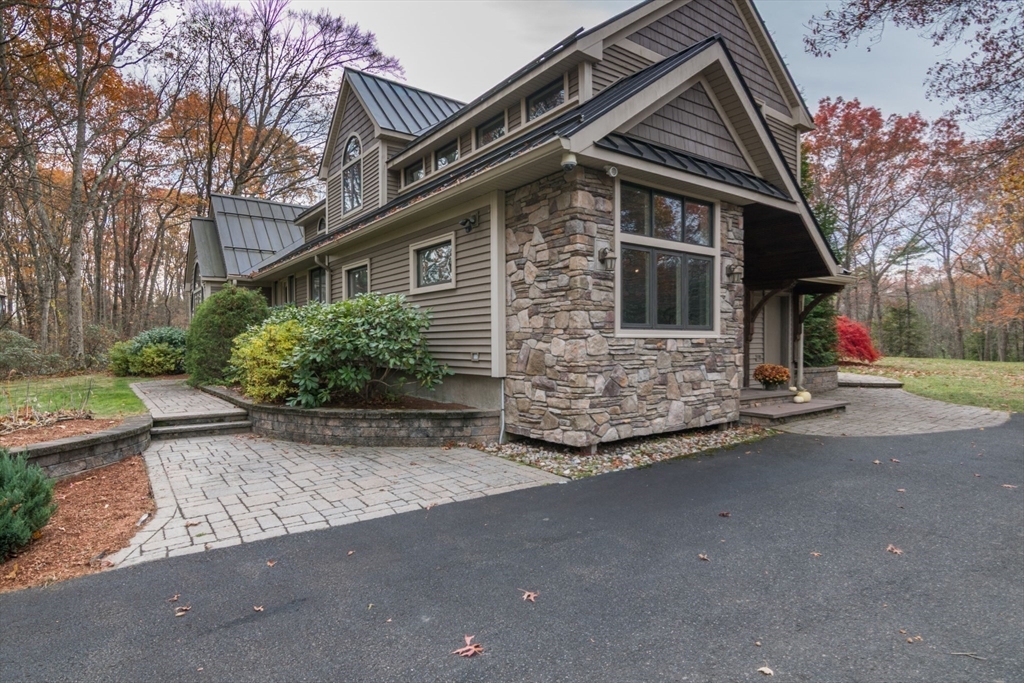 29 Rattle Hill Road Southampton, MA 01073 - Photo 3 of 42 front view of a house with a street