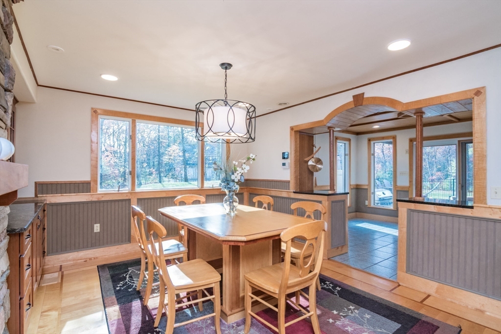 29 Rattle Hill Road Southampton, MA 01073 - Photo 10 of 42 a view of a dining room with furniture wooden floor chandelier and a rug