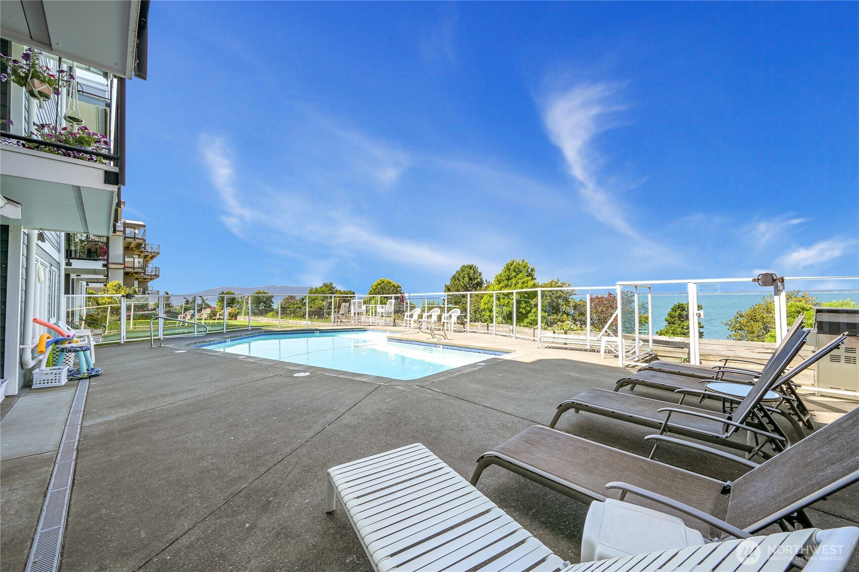 444 South State Street, Unit 317 Bellingham, WA 98225 - Photo 22 of 27 a view of a patio with swimming pool