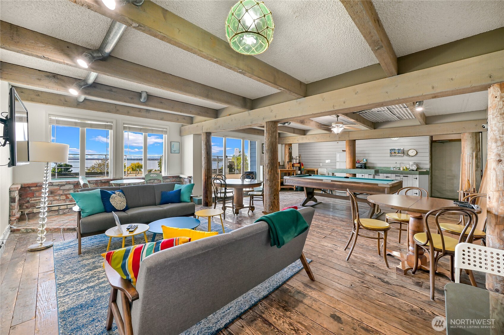 444 South State Street, Unit 317 Bellingham, WA 98225 - Photo 24 of 27 a living room with furniture and a table