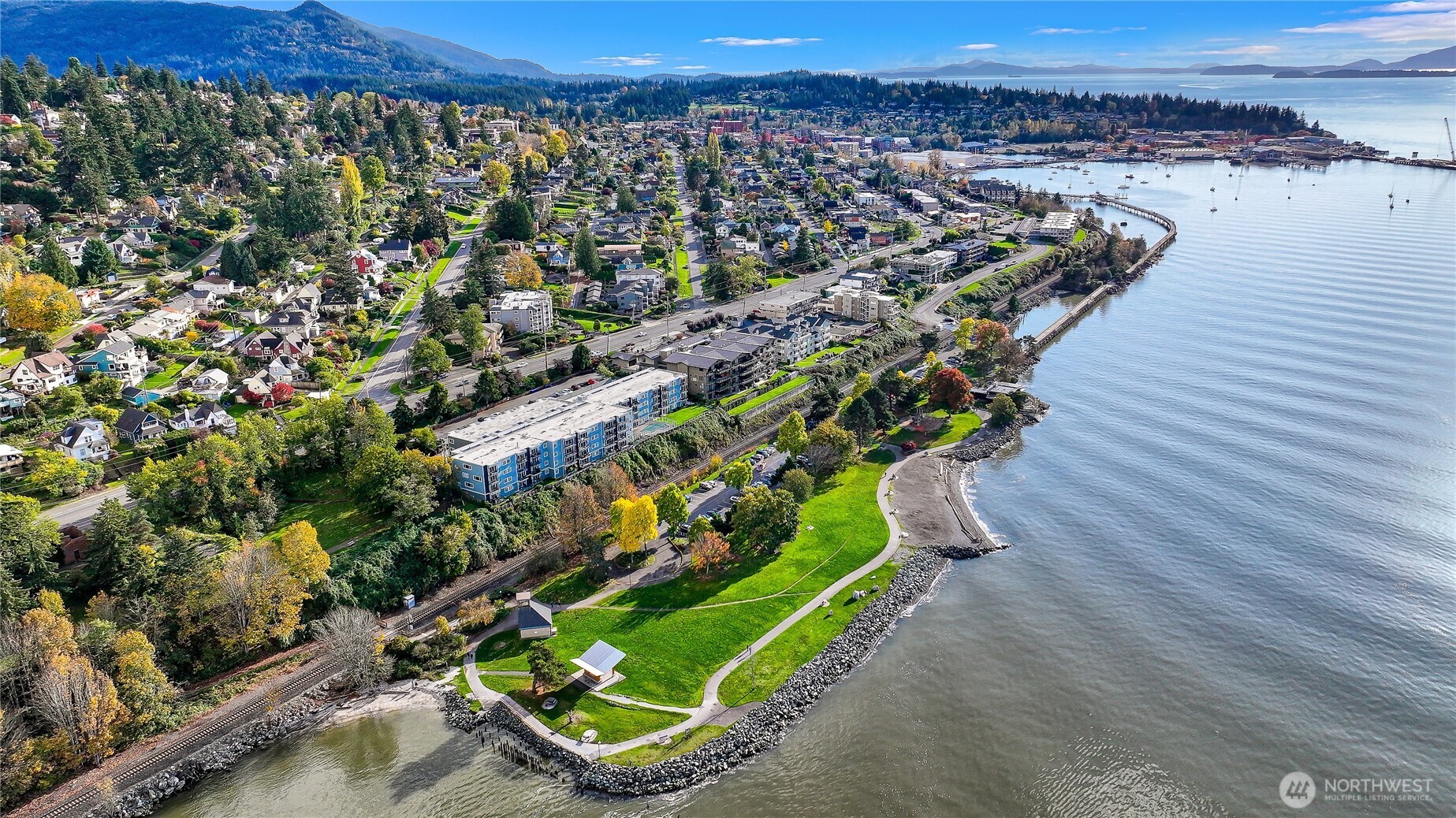 444 South State Street, Unit 317 Bellingham, WA 98225 - Photo 27 of 27 a view of a yard with a wooden fence