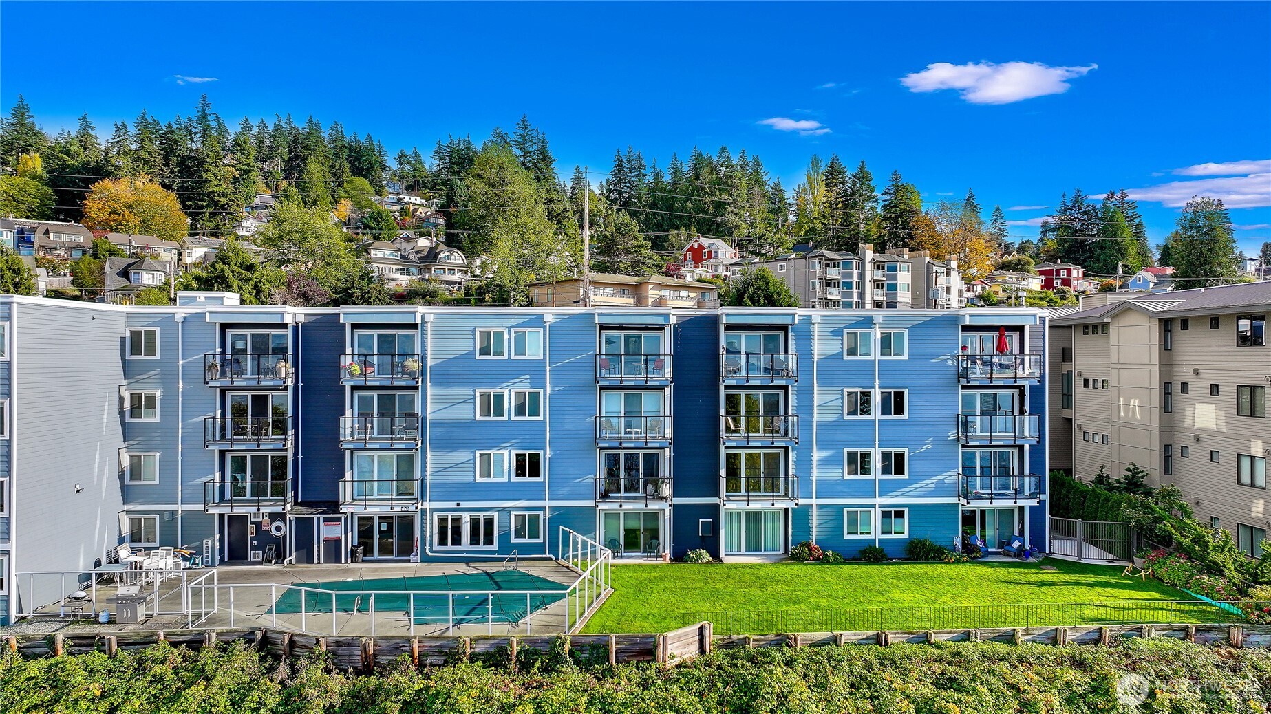 444 South State Street, Unit 317 Bellingham, WA 98225 - Photo 3 of 27 a view of a building with a yard