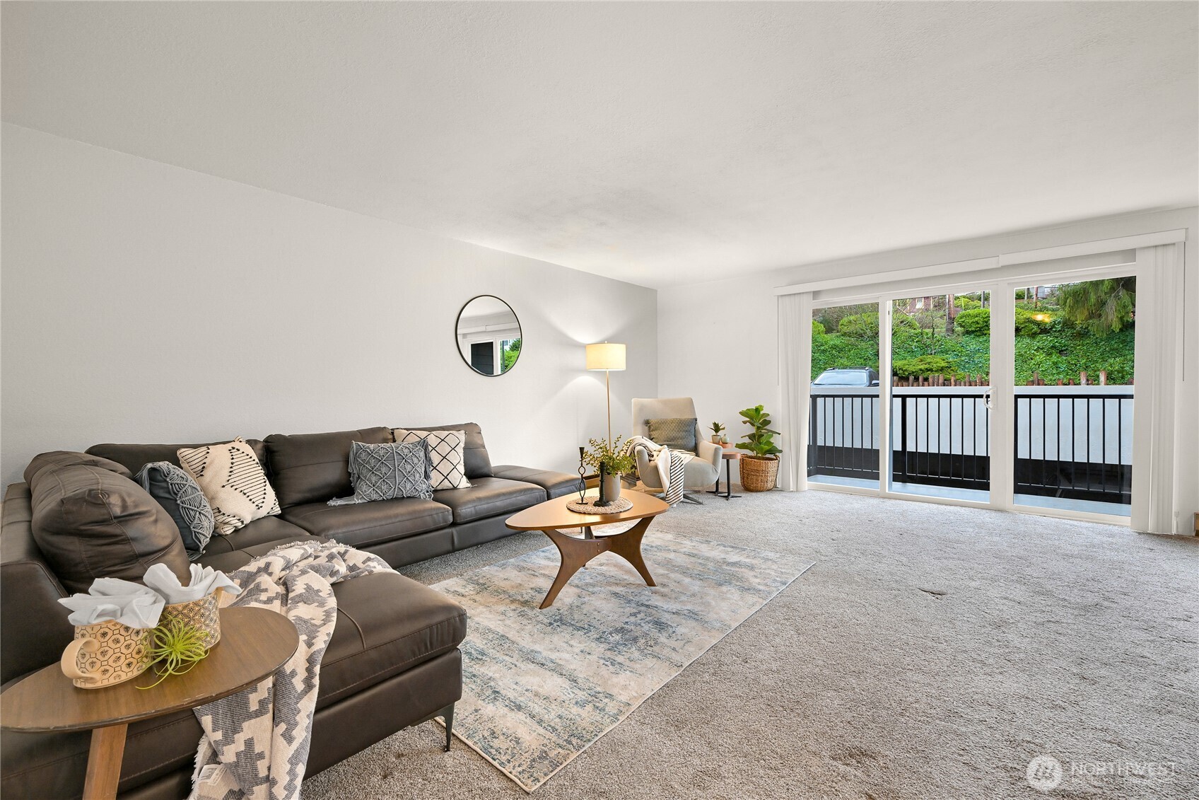 444 South State Street, Unit 317 Bellingham, WA 98225 - Photo 5 of 27 a living room with furniture and wooden floor