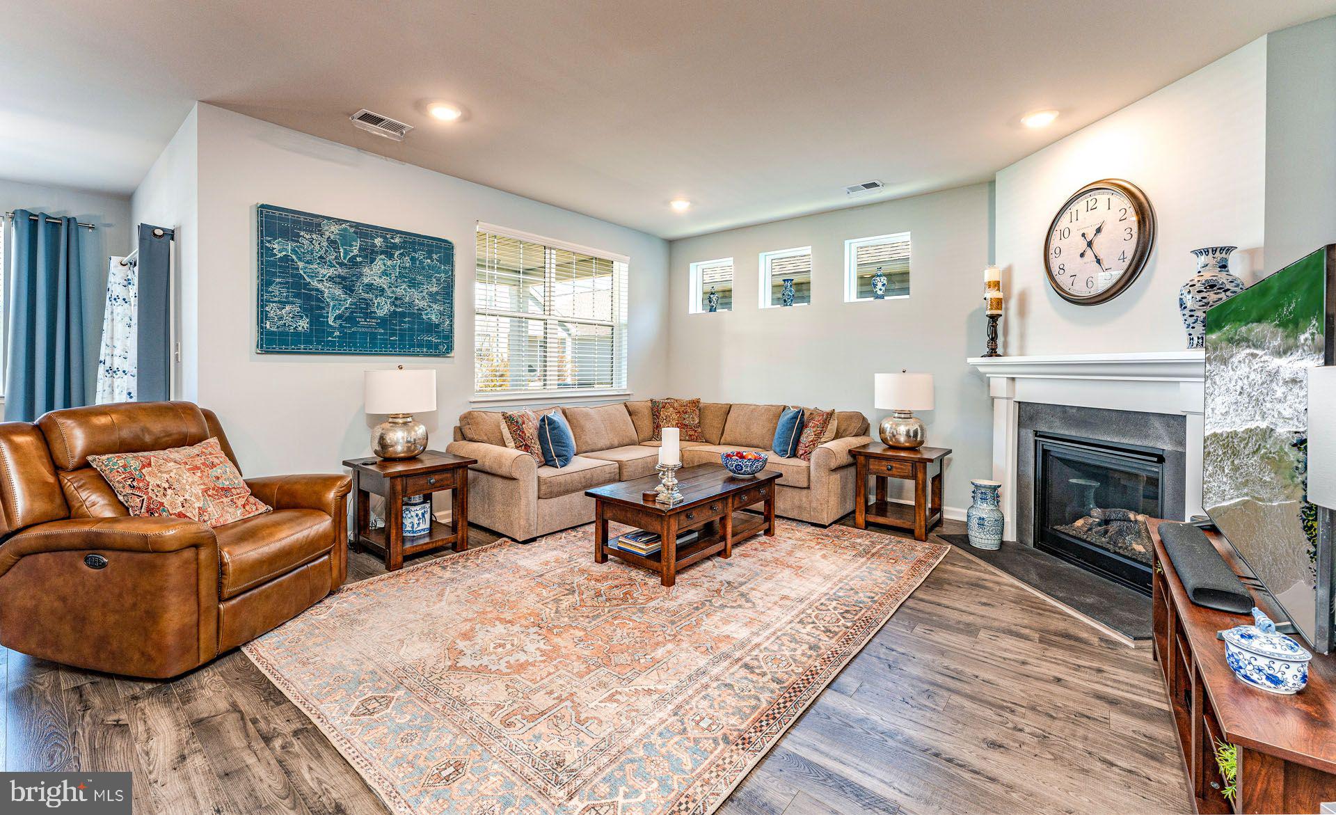 36 Walton Way Delanco, NJ 08075 - Photo 11 of 39 a living room with furniture a large window and a fireplace