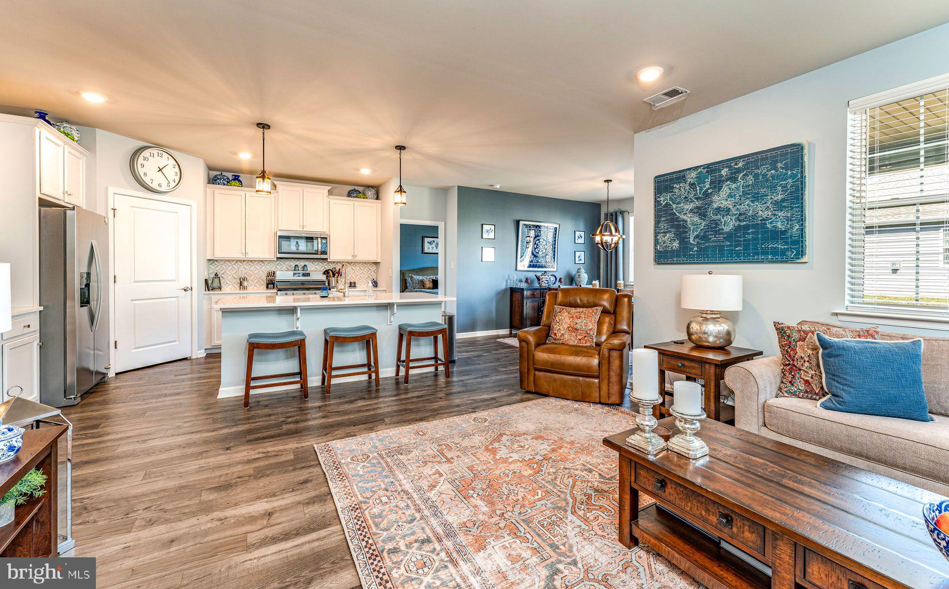 36 Walton Way Delanco, NJ 08075 - Photo 12 of 39 a living room with stainless steel appliances kitchen island granite countertop furniture and a wooden floor