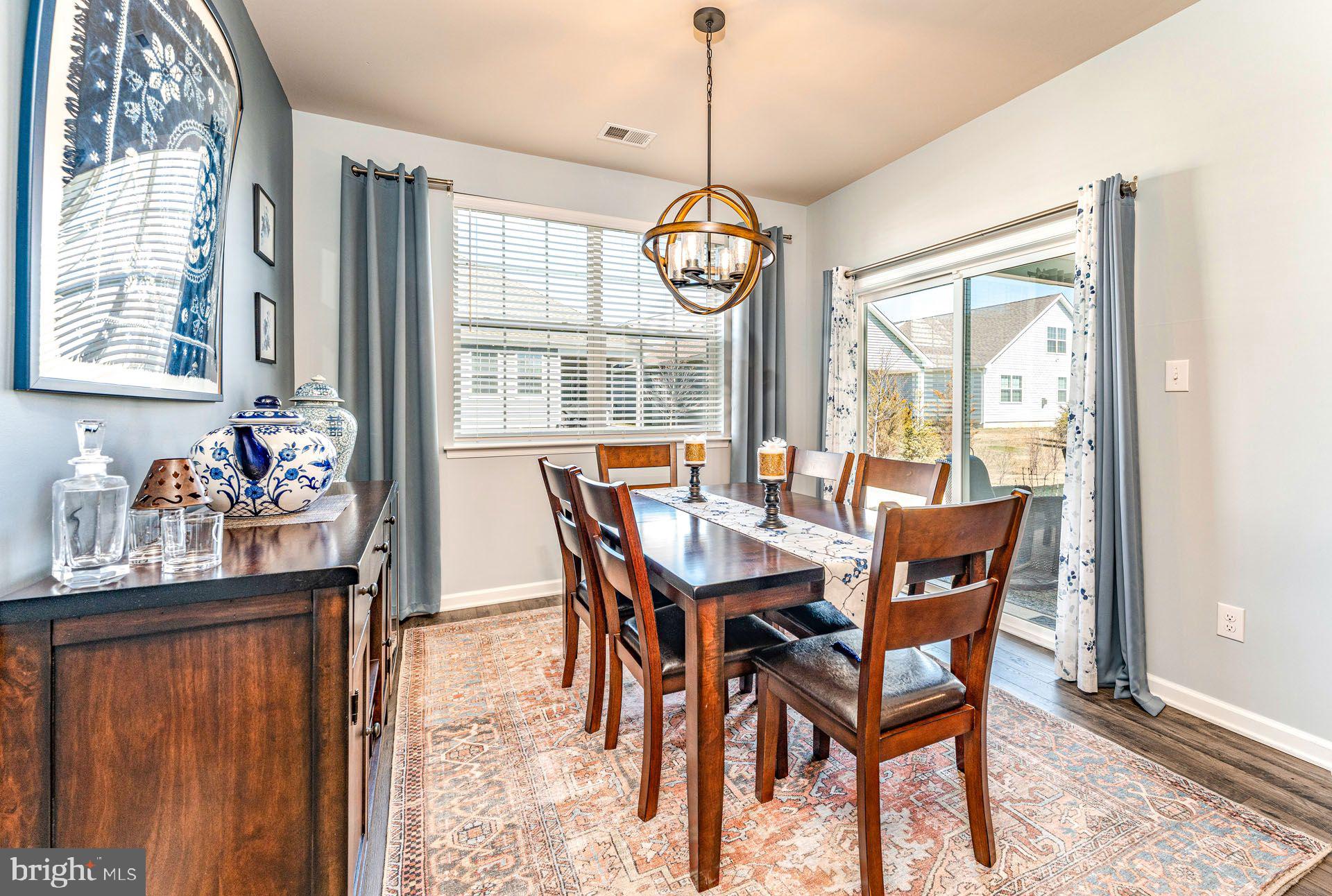 36 Walton Way Delanco, NJ 08075 - Photo 13 of 39 a view of a dining room with furniture large windows and wooden floor