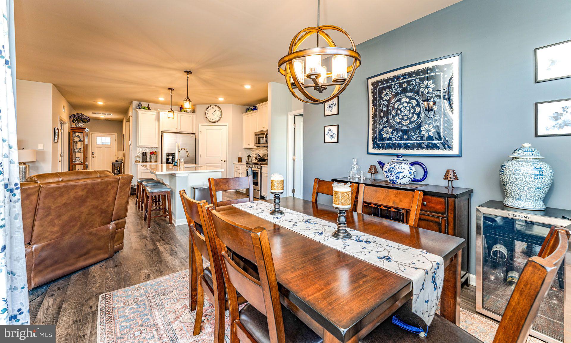 36 Walton Way Delanco, NJ 08075 - Photo 14 of 39 a dining room with wooden floor and chandelier