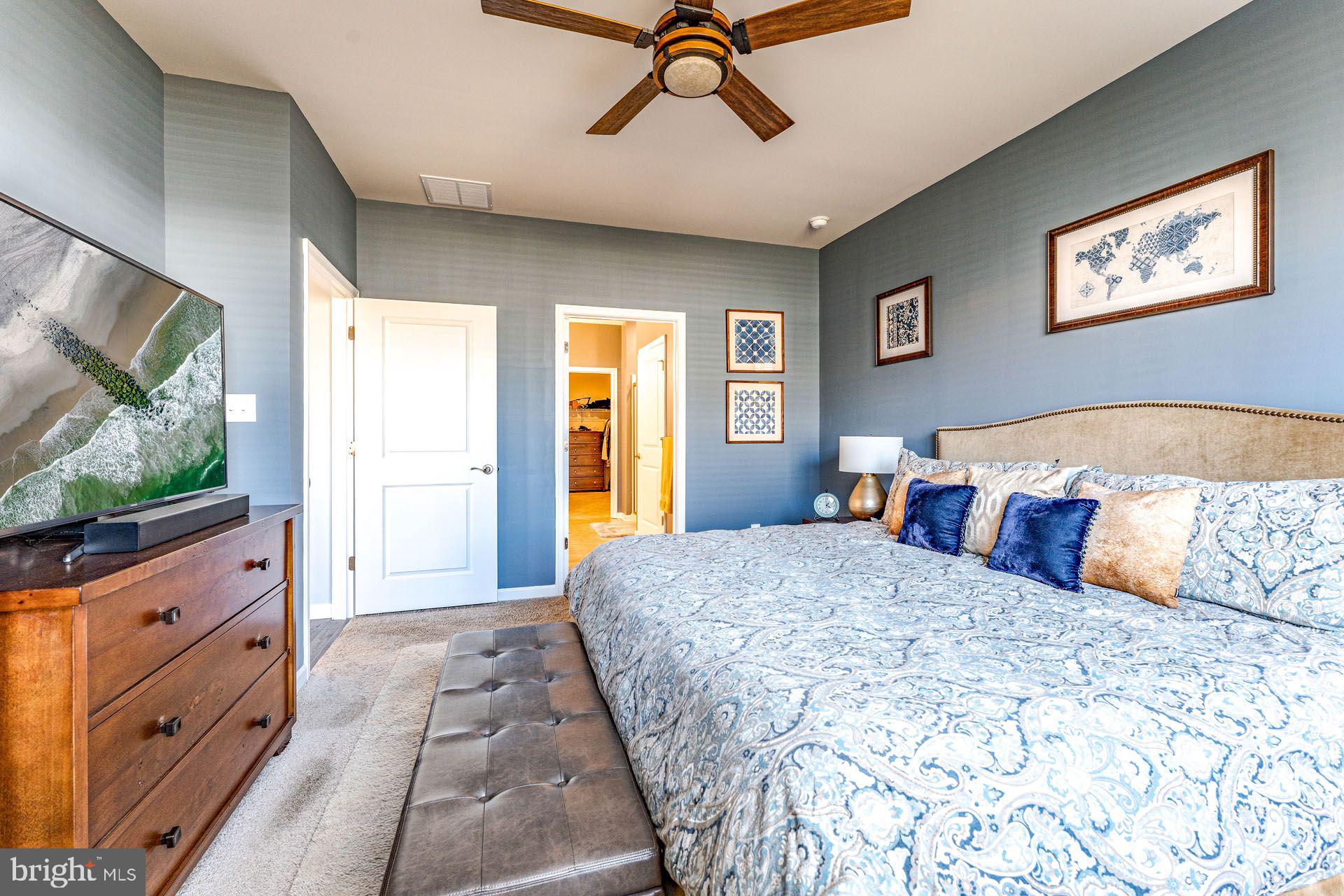 36 Walton Way Delanco, NJ 08075 - Photo 18 of 39 a bedroom with a bed and a flat screen tv