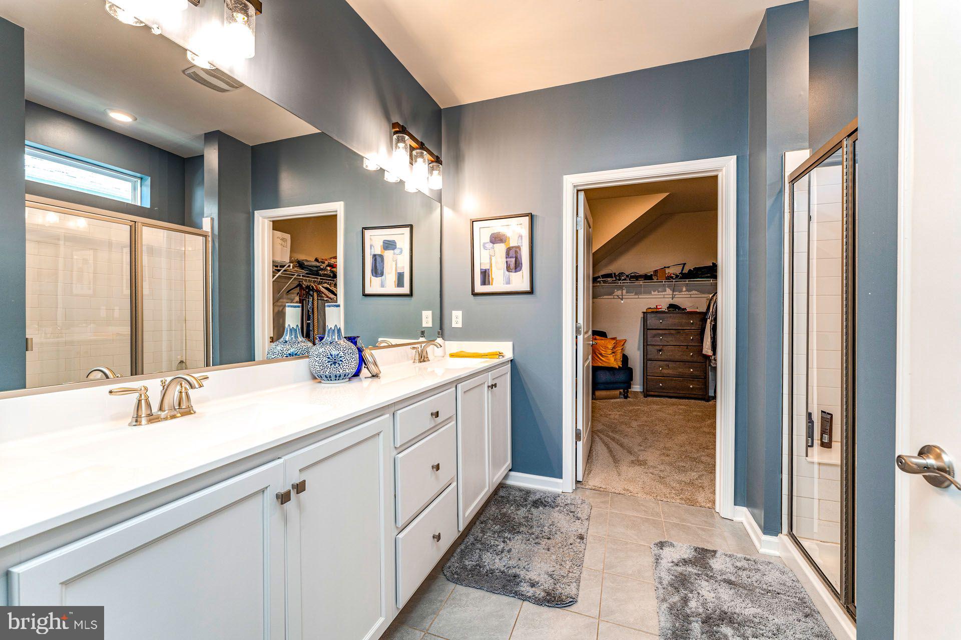 36 Walton Way Delanco, NJ 08075 - Photo 20 of 39 a en suite bathroom with a double vanity sink a mirror and a shower