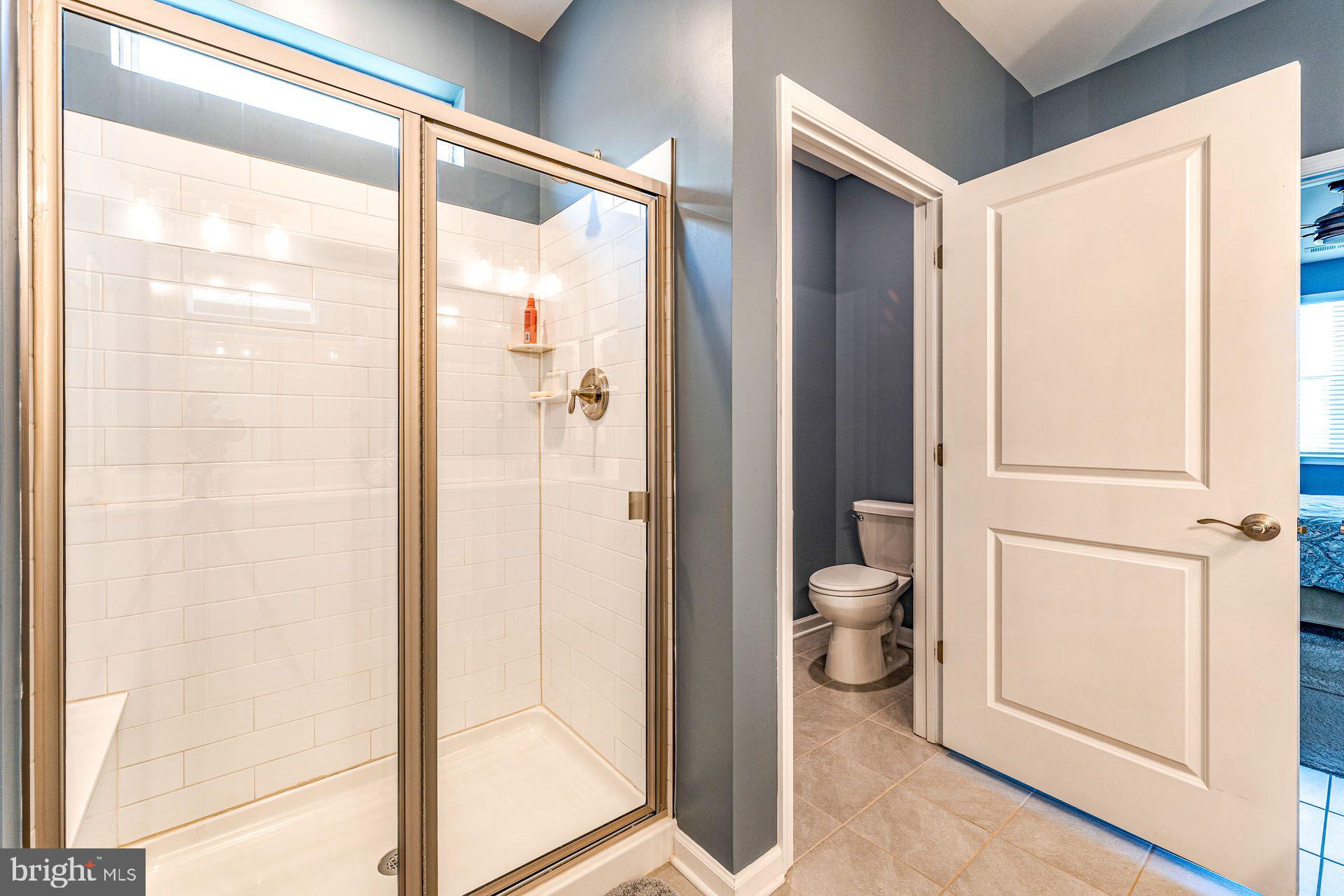 36 Walton Way Delanco, NJ 08075 - Photo 21 of 39 a bathroom with a glass shower door