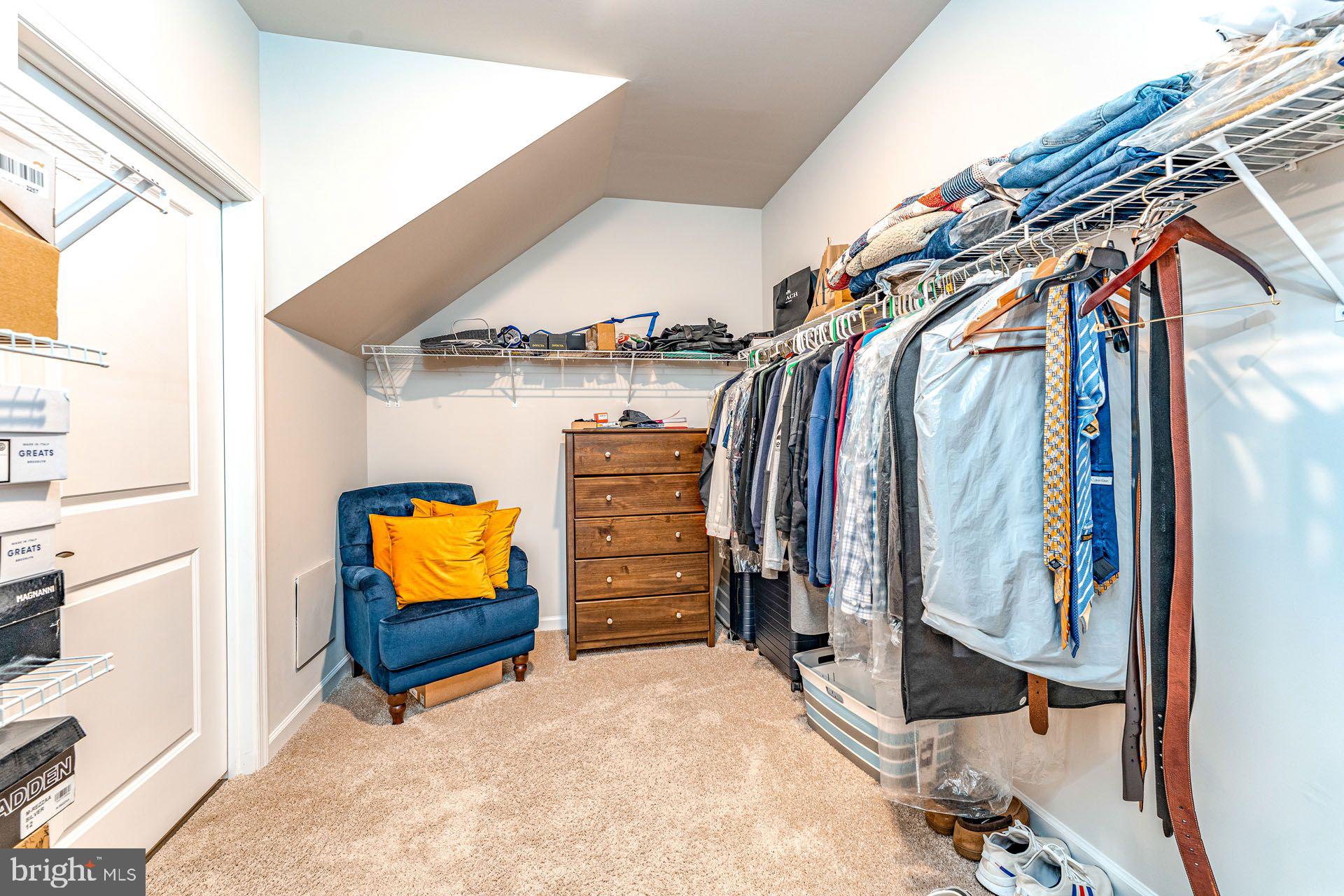 36 Walton Way Delanco, NJ 08075 - Photo 22 of 39 a view of walk in closet with clothes and shoes
