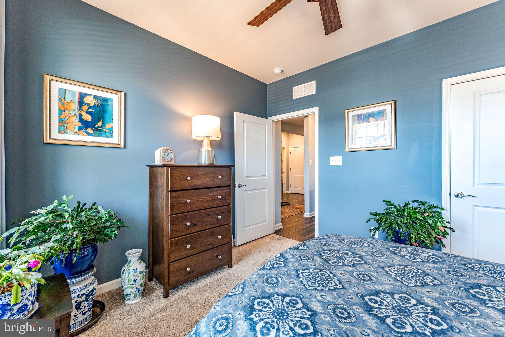 36 Walton Way Delanco, NJ 08075 - Photo 24 of 39 a room with a dresser and a potted plant