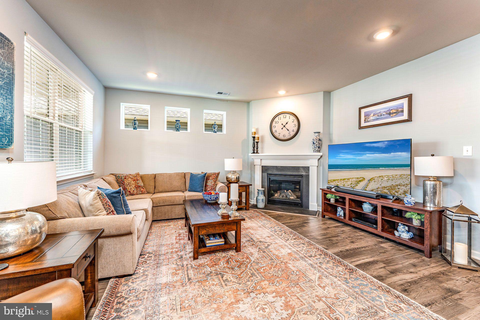 36 Walton Way Delanco, NJ 08075 - Photo 10 of 39 a living room with furniture a fireplace and a window