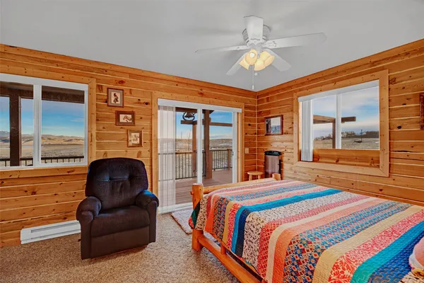 a bedroom with a bed and furniture