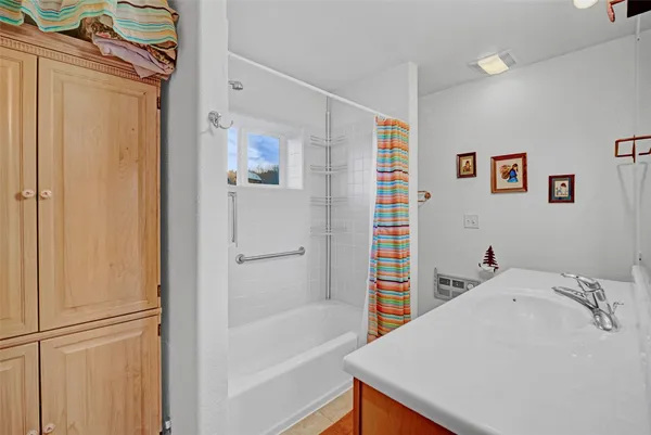 a bathroom with a sink and a bathtub