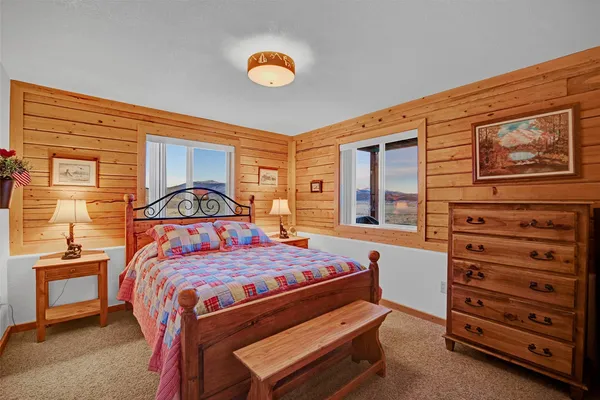 a view of a livingroom with furniture and windows