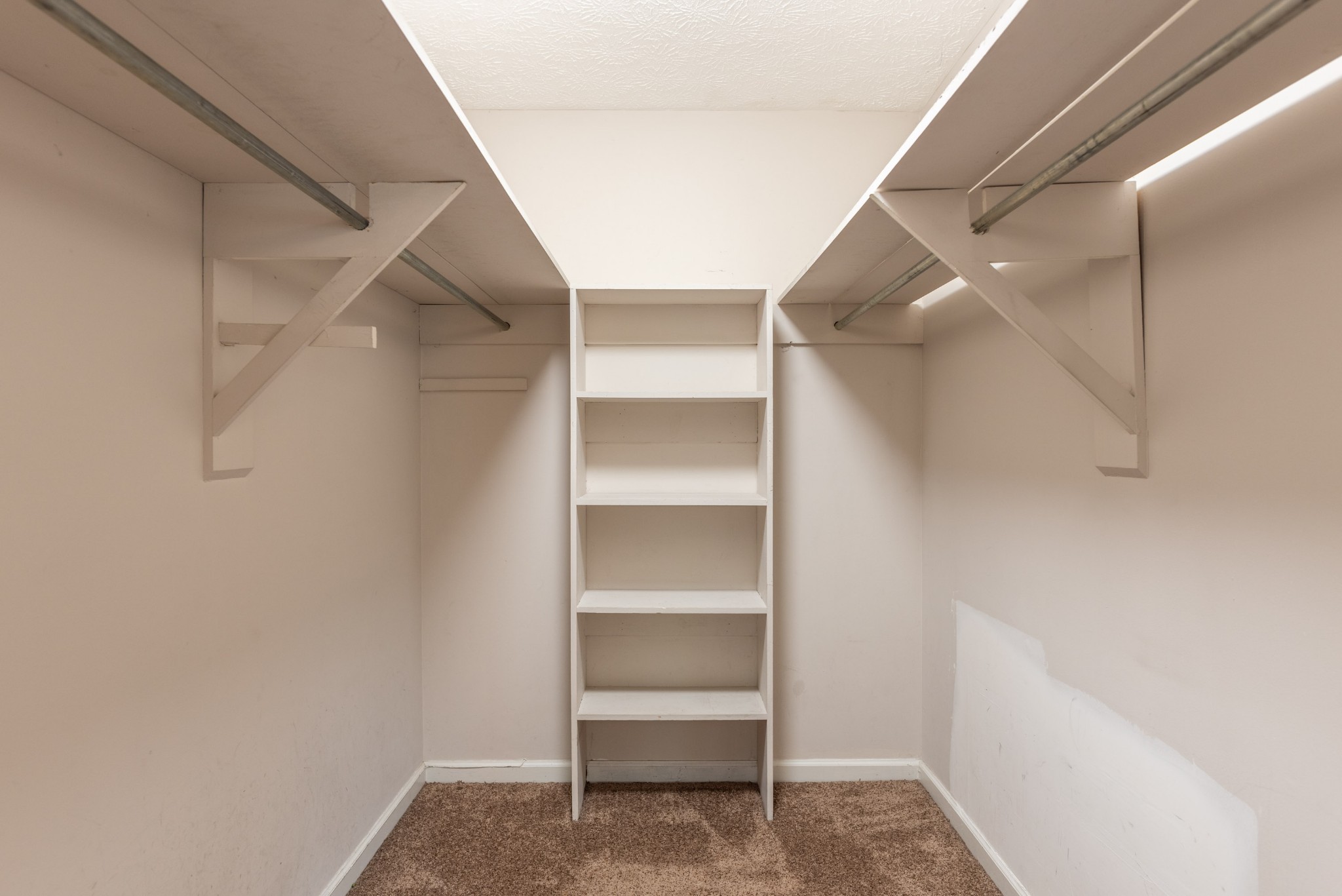 6948 Stone Creek Road Nashville, TN 37221 - Photo 22 of 37 a view of an empty walk in closet