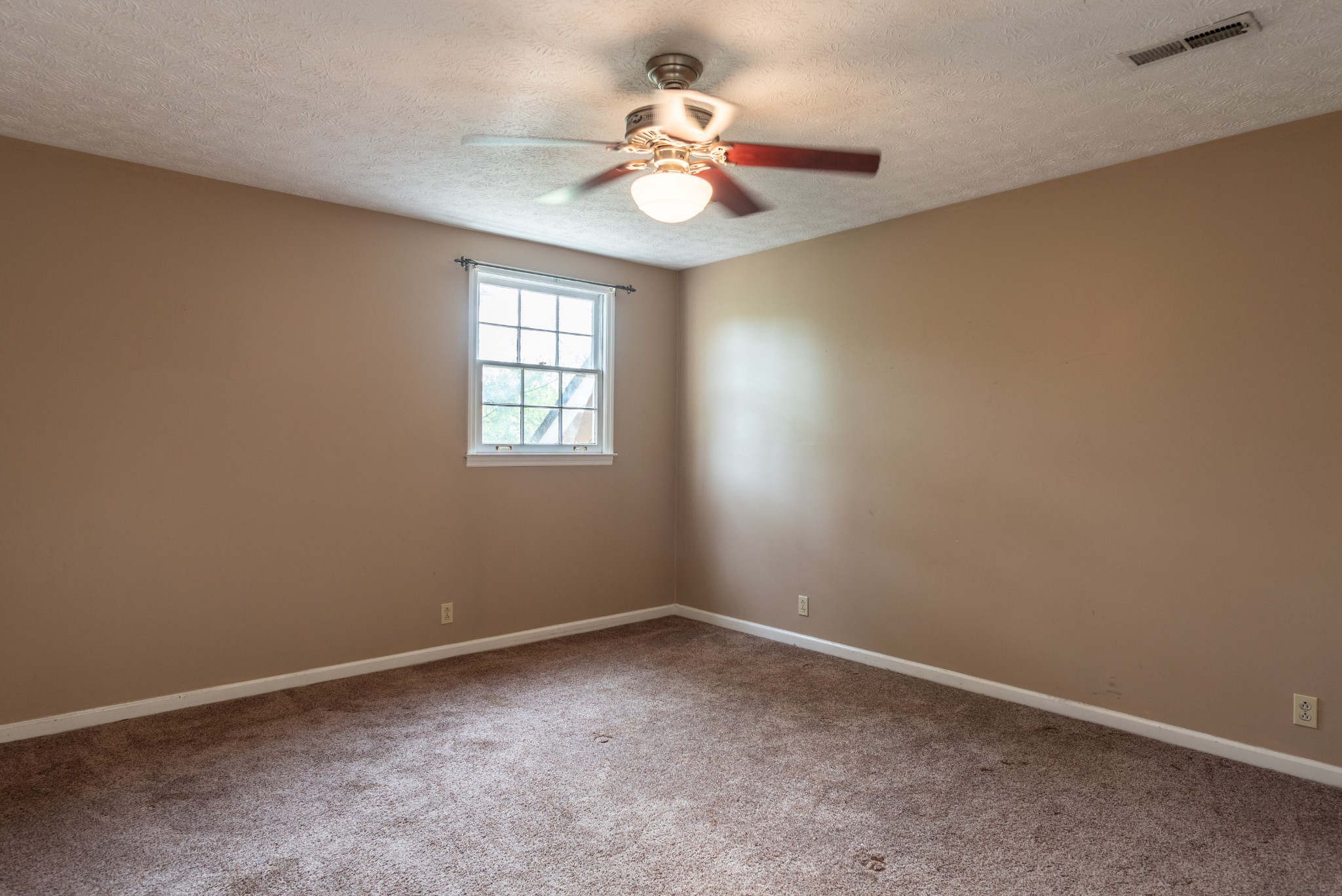 6948 Stone Creek Road Nashville, TN 37221 - Photo 32 of 37 a view of an empty room with a window