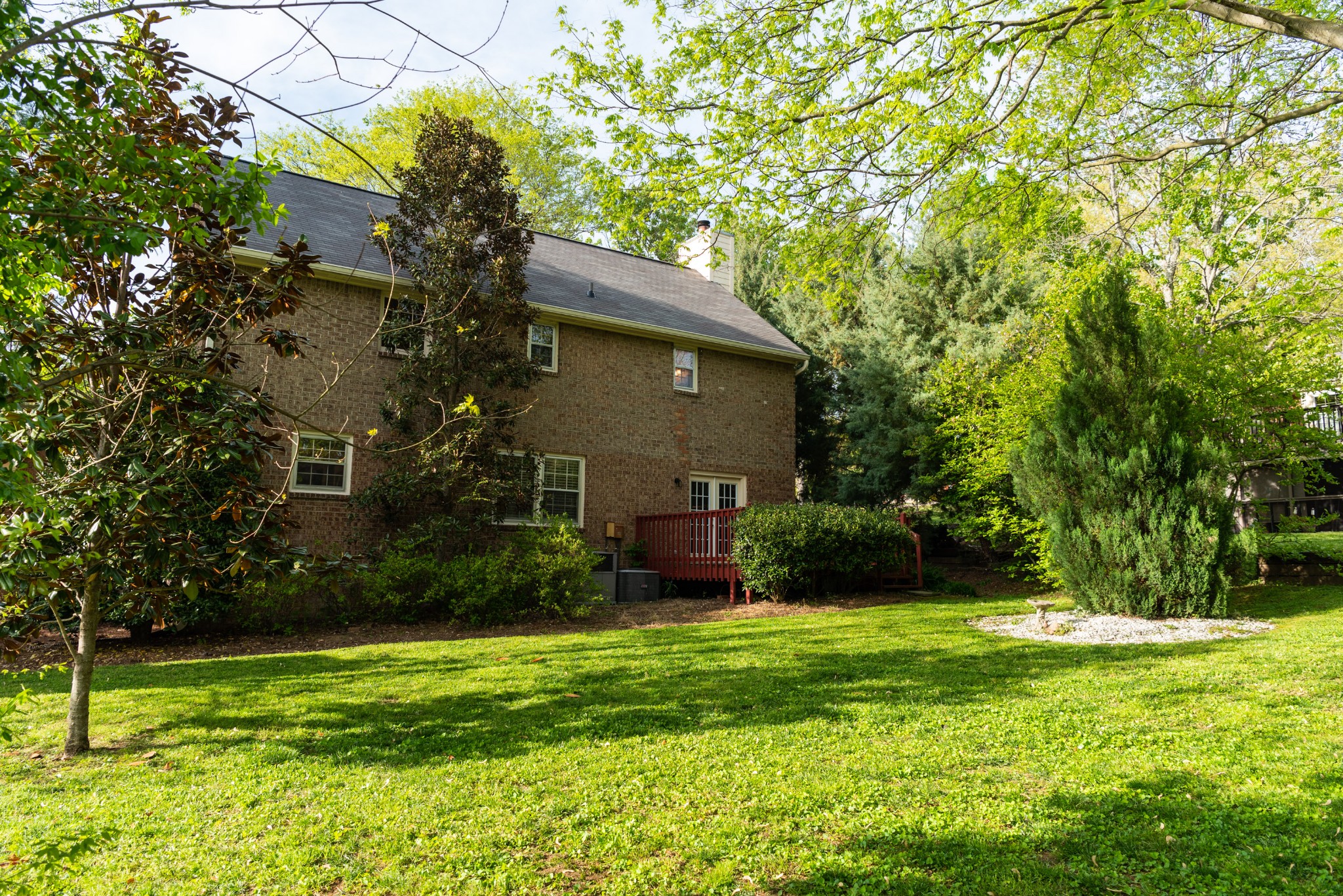 6948 Stone Creek Road Nashville, TN 37221 - Photo 37 of 37 a view of a house with a yard and tree s