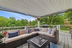 283 Brookwood Road Venetia, PA 15367 - Photo 19 of 36 a roof deck with couches and wooden fence