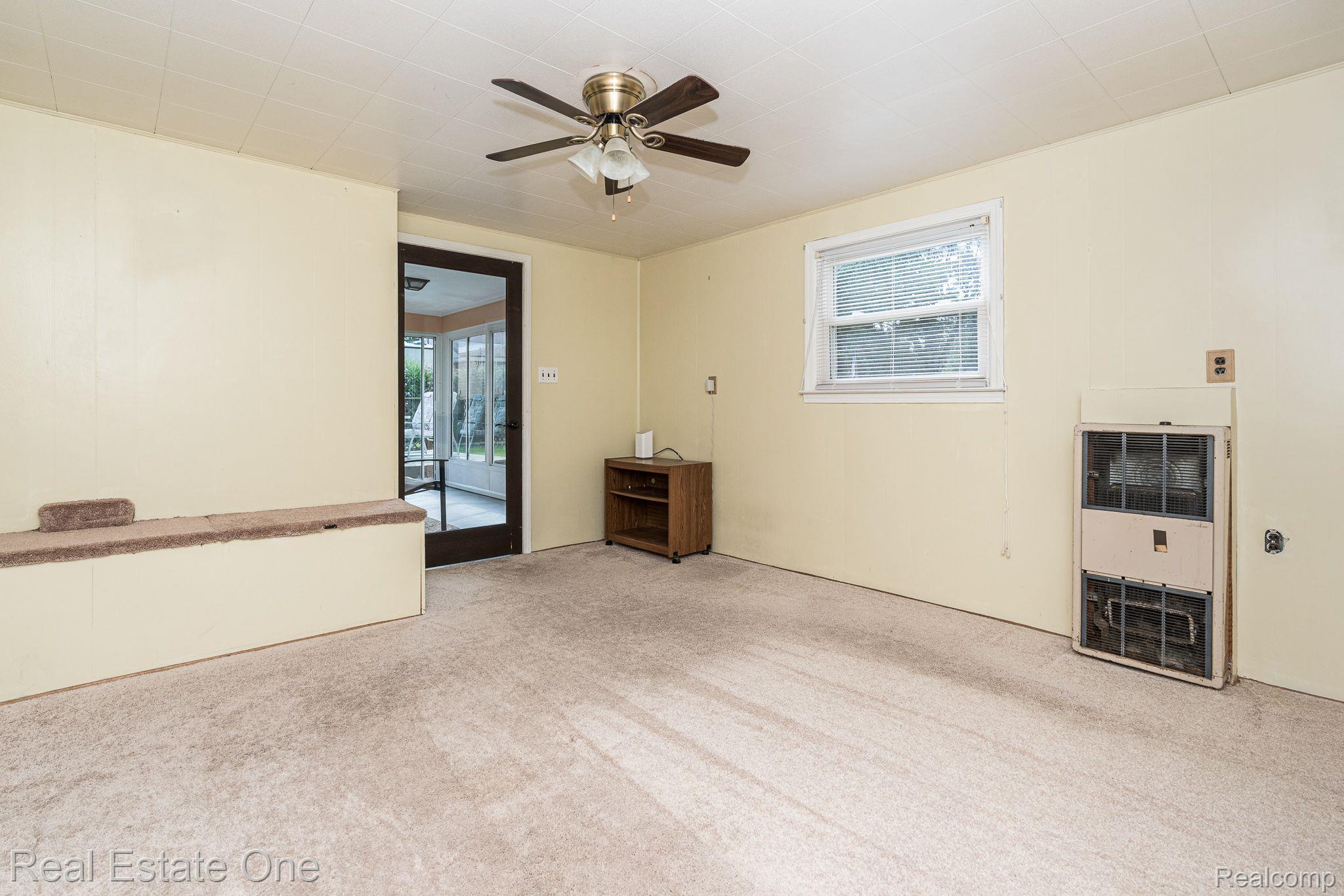 33250 Edgegrove Road Fraser, MI 48026 - Photo 16 of 24 Bonus room entry from 3-season room