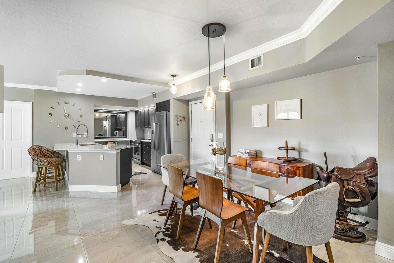600 South Dixie Highway, Unit 331 West Palm Beach, FL 33401 - Photo 13 of 39 a view of a dining room with furniture