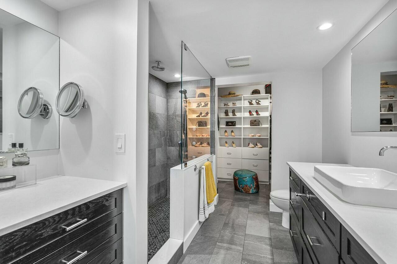 600 South Dixie Highway, Unit 331 West Palm Beach, FL 33401 - Photo 16 of 39 a kitchen that has a sink and a stove in it