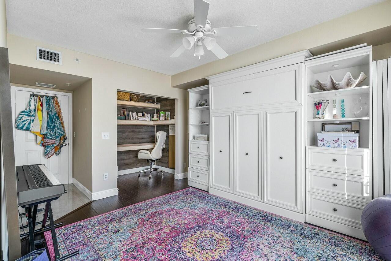 600 South Dixie Highway, Unit 331 West Palm Beach, FL 33401 - Photo 27 of 39 a living room with furniture and a rug