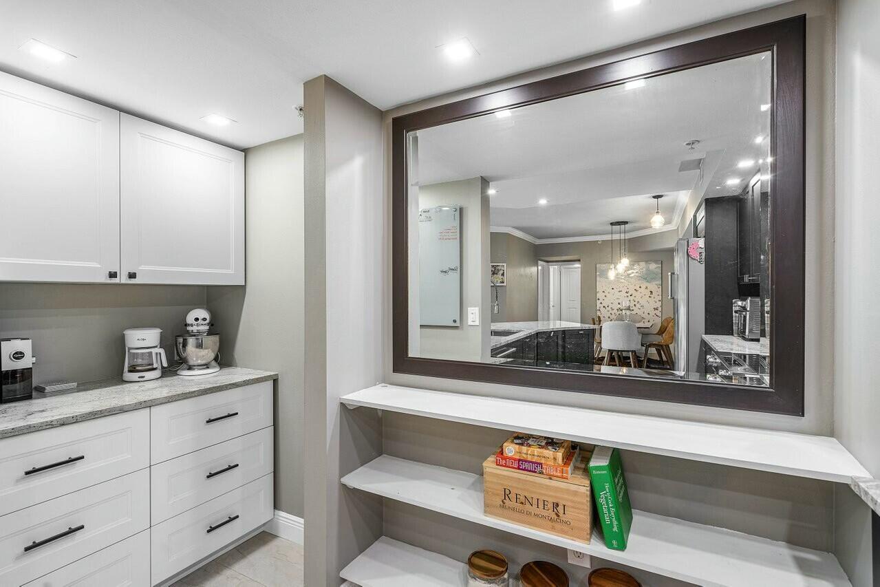 600 South Dixie Highway, Unit 331 West Palm Beach, FL 33401 - Photo 10 of 39 a bathroom with a sink and a mirror