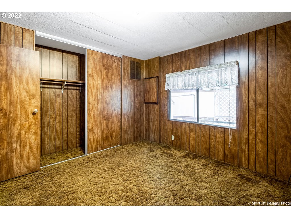 1125 58th Street, Unit 20 Springfield, OR 97478 - Photo 18 of 29 a view of an empty room with a window