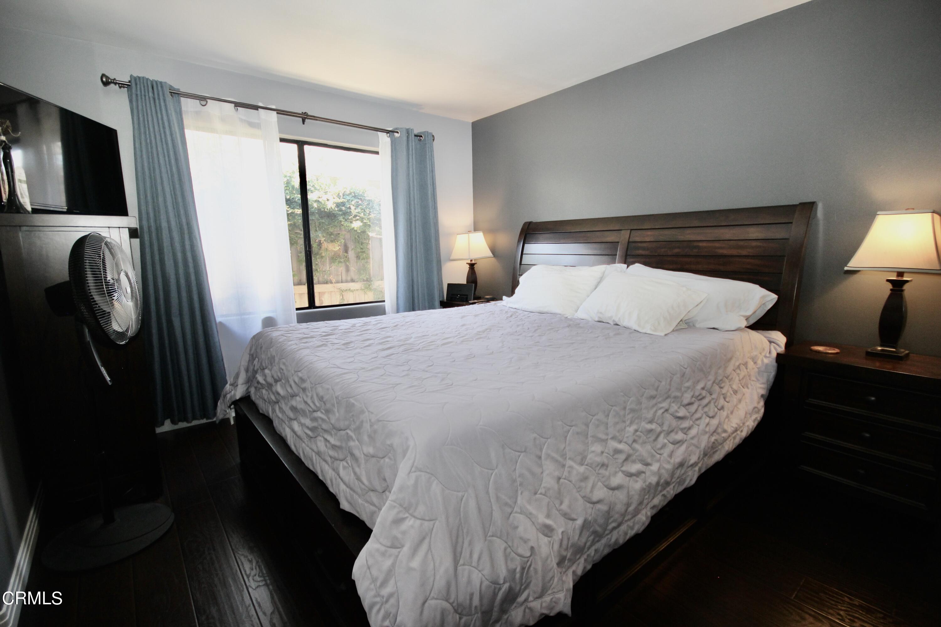 1966 Sutter Place Oxnard, CA 93033 - Photo 11 of 19 a bed sitting in a bedroom next to a window