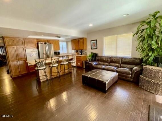 1966 Sutter Place Oxnard, CA 93033 - Photo 5 of 19 a living room with furniture and a large window