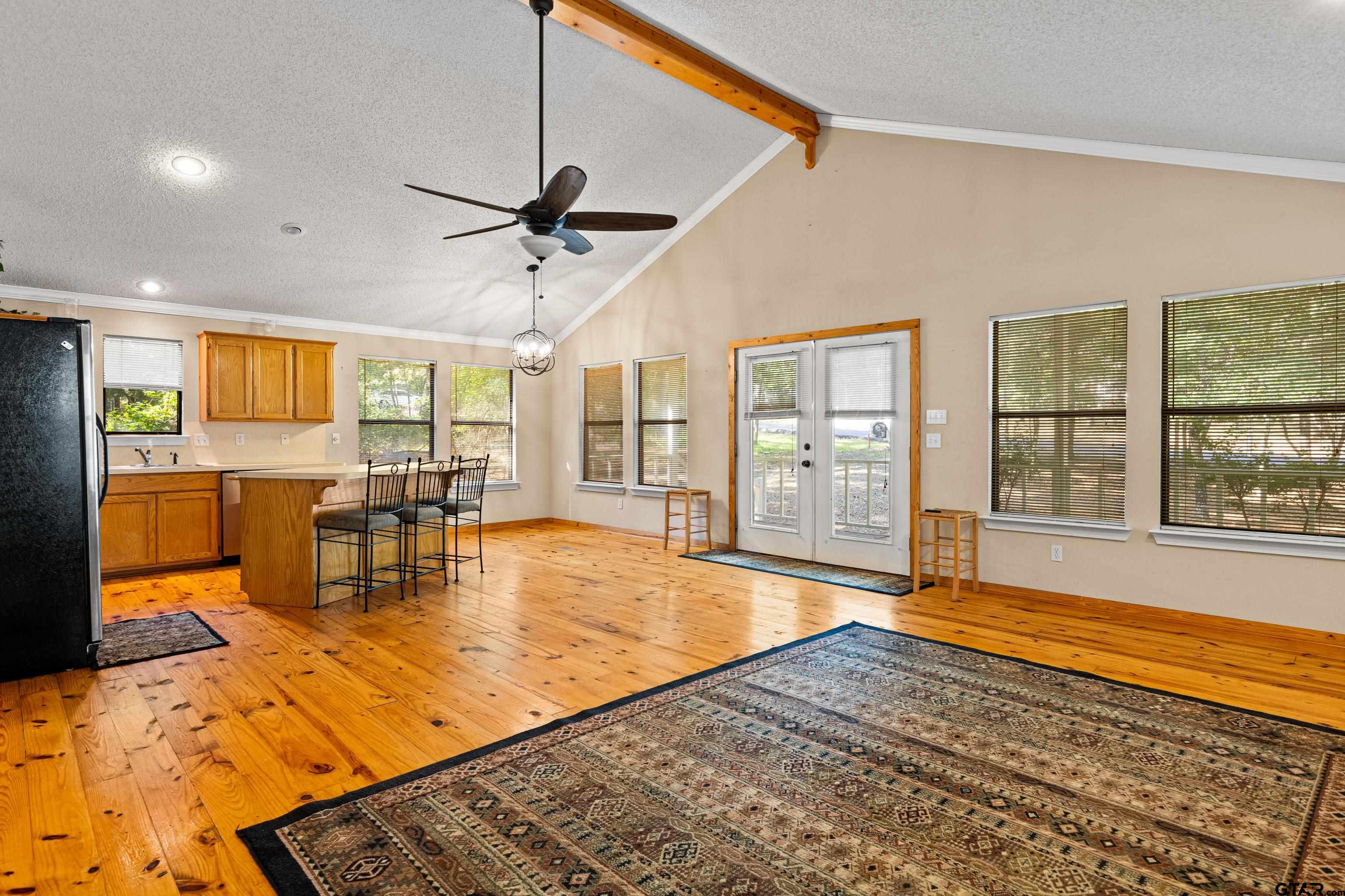 149 Primrose Path Holly Lake Ranch, TX 75765 - Photo 32 of 36 a view of a living room and dining room