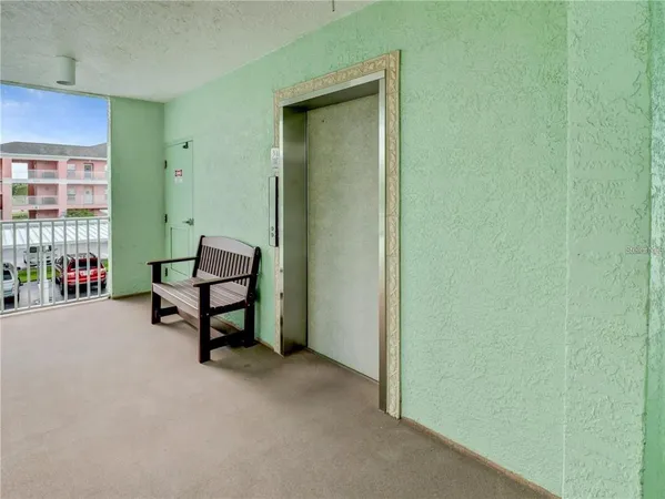 a view of game room with lounge chair