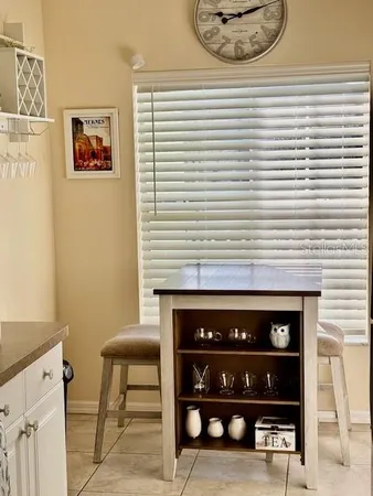 a view of a livingroom with furniture and window