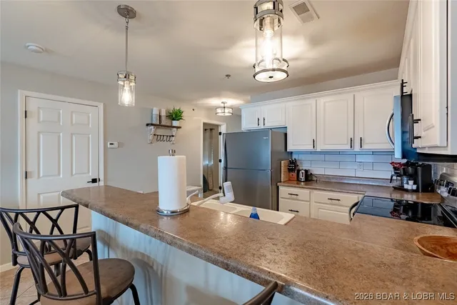 $389,000 | 305 Highland Shores Drive, Unit 3A, Lake Ozark, MO 65049