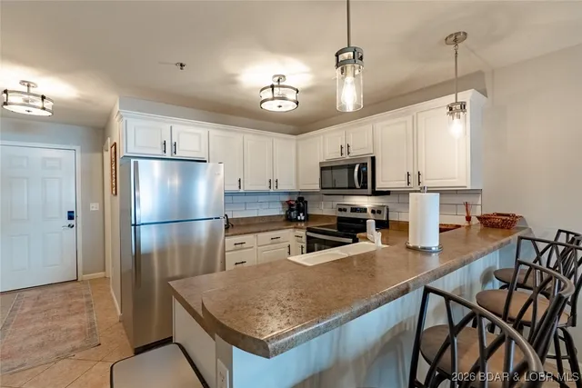 $389,000 | 305 Highland Shores Drive, Unit 3A, Lake Ozark, MO 65049