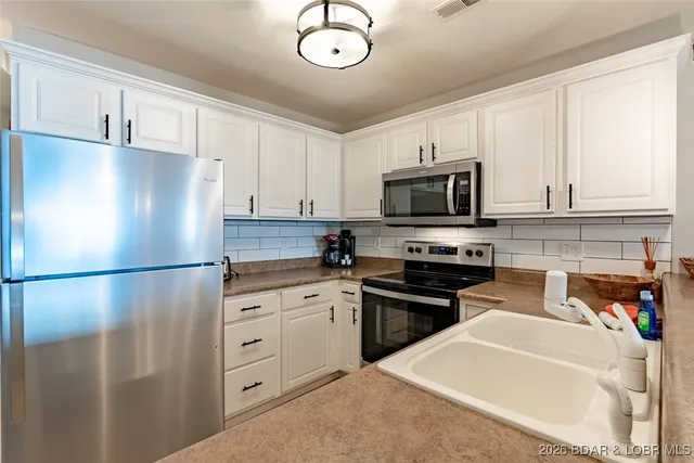 $389,000 | 305 Highland Shores Drive, Unit 3A, Lake Ozark, MO 65049