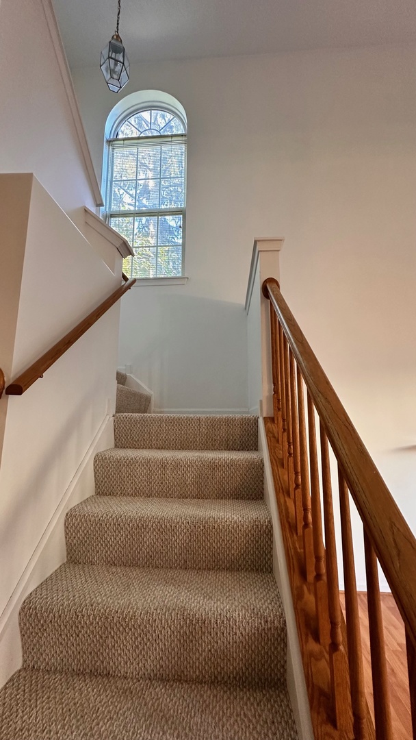 5412 Teaberry Court, Unit 5412 Rolling Meadows, IL 60008 - Photo 11 of 12 a view of entryway and hall with wooden floor