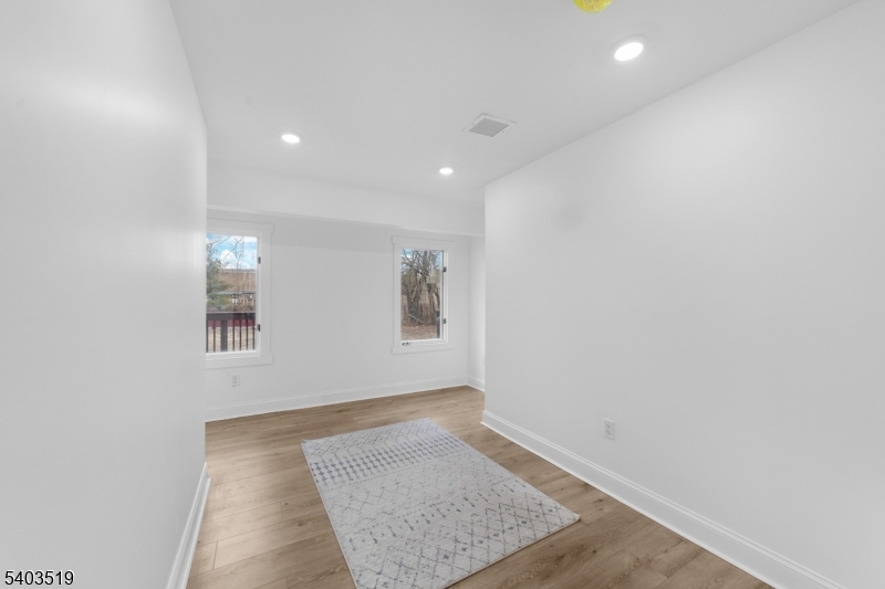 15 West Main Street Evesham, NJ 08053 - Photo 16 of 38 an empty room with a workbench