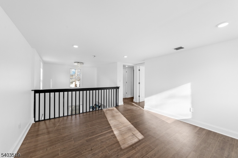 15 West Main Street Evesham, NJ 08053 - Photo 19 of 38 a view of a hallway with wooden floor
